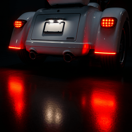 LED fender blade brake light for a Harley Trike motorcycle, featuring a sleek design with red illuminated lights visible in the image.